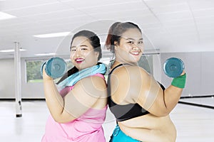 Obese women doing exercise