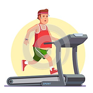 Obese young man running on treadmill photo