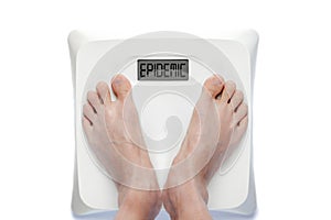 Obesity Epidemic Concept With Feet on Bathroom Scale Isolated on White Background