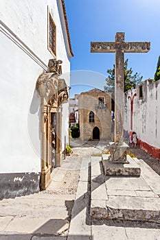 Obidos, Portugal. Misericordia Church with the Medieval Sephardic Synagogue in background