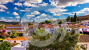 Obidos, Portugal stonewalled city with medieval fortress, historic walled town of Obidos, near Lisbon, Portugal. Beautiful view of