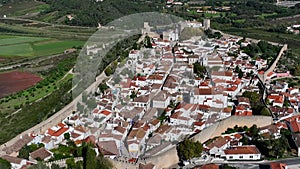 Obidos Town in Portugal. It is located on a hilltop, encircled by a fortified wall. Famous Place. 4k