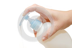 Object - Bottle of liquid soap in female hand