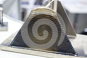 Object printed by 3D printer from metal. Additive manufacturing solution