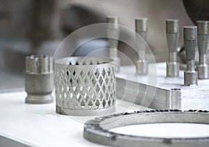 Object printed on metal 3d printer close-up.