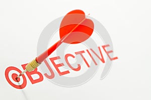 Objective text with dart on target photo