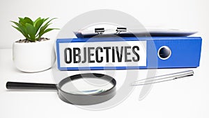 Objectives words on labels with document binders