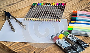 Objects for drawing and painting, crayons, tempera, crayons, compass