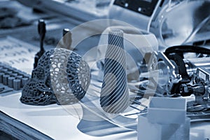 Objects printed by a 3d printer close-up. Progressive modern additive technology