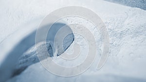 Objects printed 3D printer from powdered polyamide lying white polyamide powder