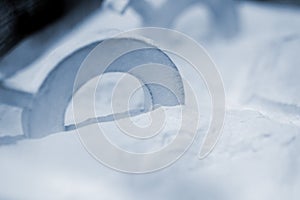 Objects printed 3D printer from powdered polyamide lying white polyamide powder