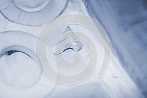 Objects printed 3D printer from powdered polyamide lying white polyamide powder