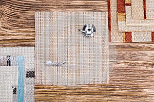 Objects for sewing and creativity on a wooden background