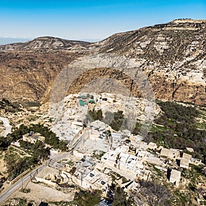 Oblique aerial view of Dana Village at the entrance of the biosphere reserve of the Dana Valley, north of Petra