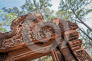 Oblique angle shot of Banteay Srei or Banteay Srey temple doorway,