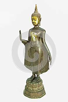 Oblique side of ancient Buddha metal statue isolated on white background