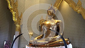 Oblique view of a golden buddha at wat traimit temple in bangkok, thailand