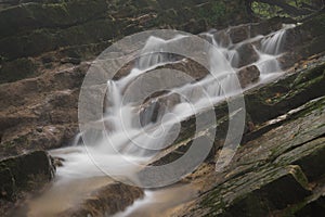 Oblique waterfall in the forest