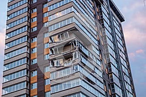 Obninsk, Russia - April 21, 2018: Damage to loggias on a 20-storey house photo