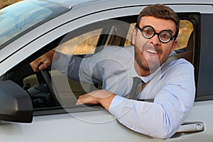 Obnoxious driver with very thick eyeglasses