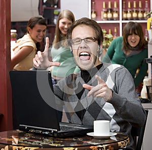 Obnoxious young man singing loudly