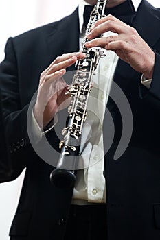 Oboe in the hands of a musician