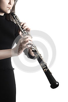 Oboe player hands playing musical instrument