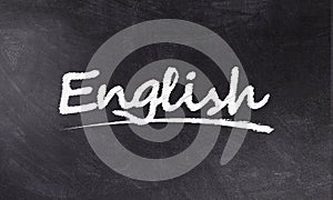 Blackboard sign with the word English written in chalk. English classes. photo