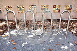 Obscure Bicycle Rack with Colored Tiles in Background