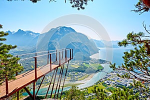 Observation deck Rampestreken in Andalsnes, Norway. Beautiful view on the mountains, the city and the fjords. Tourist place in