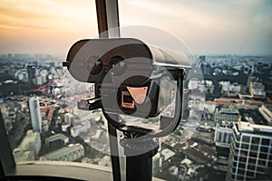 Observation deck on  tall building with large binoculars to observe the beautiful panorama of Saigon or Ho Chi Minh city. Vietnam