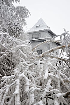 Observation hut on the hill in winter Sitno
