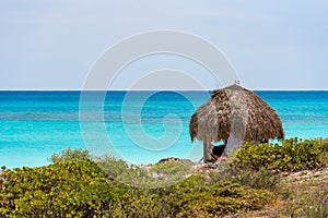 Observation tower on the sandy beach of the Playa Paradise, on the island of Cayo Largo, Cuba. Copy space for text. photo