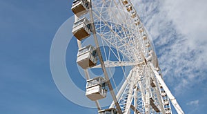 Observation Wheel Against the Blue Sky