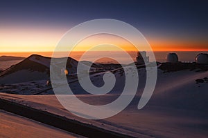 Observatories at Snowy Mauna Kea Summit Sunset photo