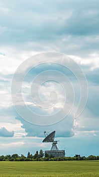 Observatory Antenna in Grass Field