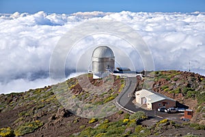 Observatory over clouds