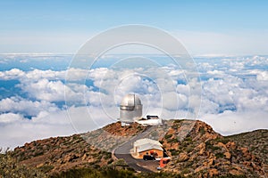 Observatory over the clouds photo