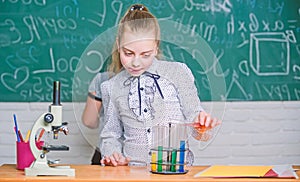 Observe chemical reactions. Chemical reaction much more exciting than theory. Girls working chemical experiment. Natural