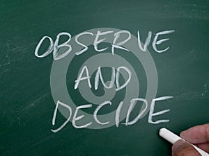 Observe and decide, word text written on chalkboard, motivational inspirational life and business quotes