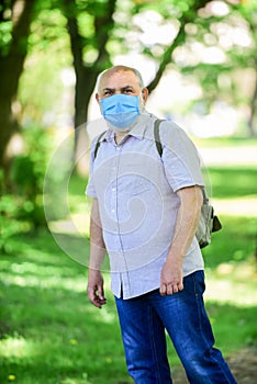 Observe precautions while pandemic. healthy life. wear mask in park. care your health. protect yourself from virus. man