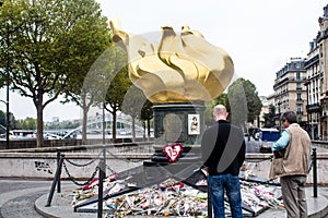 Observers stand by Flame of Liberty in Paris as unofficial memorial to Princess Diana