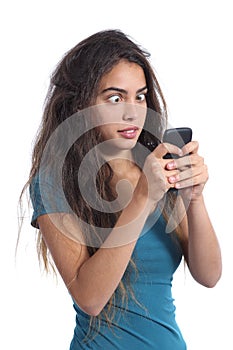 Obsessed teenager girl with the mobile phone technology photo