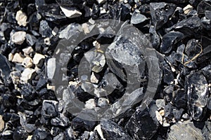 Obsidian volcanic glass. in natural raw form