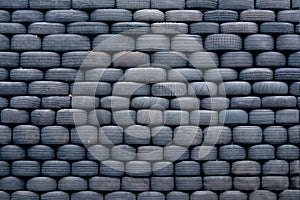 obsolete car tires stacked for background, old and used, road safety concept