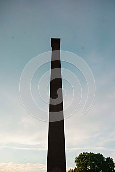Obsolete industry, factory chimney, symbol