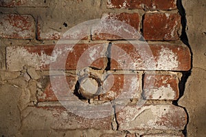 Obsolete plastered brick wall