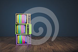 Obsolete rainbow TV pile