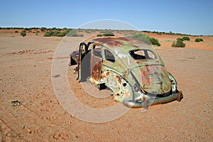 Obsolete rusted car. photo