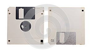 Obsolete technology - two used floppy discs isolated on white